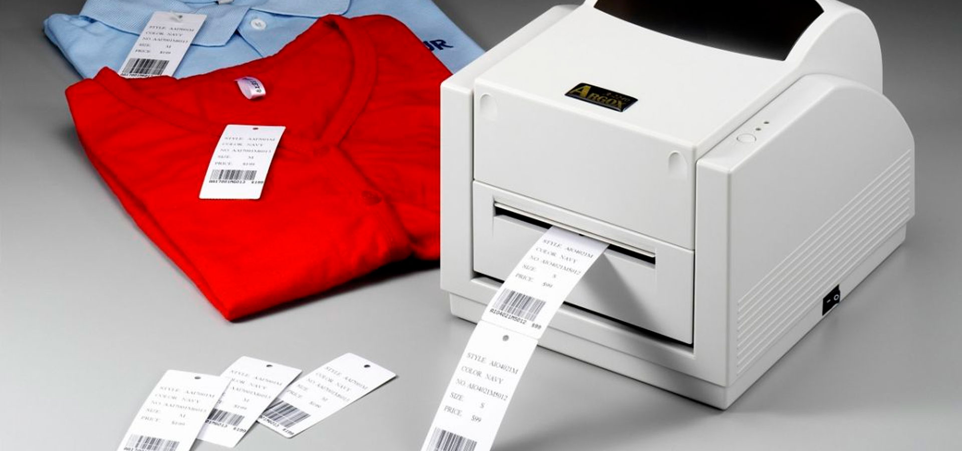 Проверка этикеток. Принтер. Маркировочный принтер. Принтер для печати бирок на одежду. Принтер этикеток для одежды.
